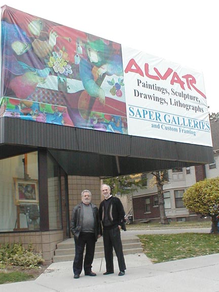 Alvar and Roy Saper in front
                    of Saper Galleries
