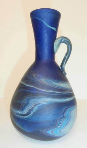 Extended
                  neck one handle vase