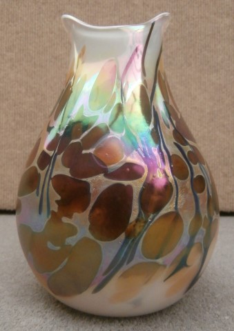 Bronze
                      on white pouch vase
